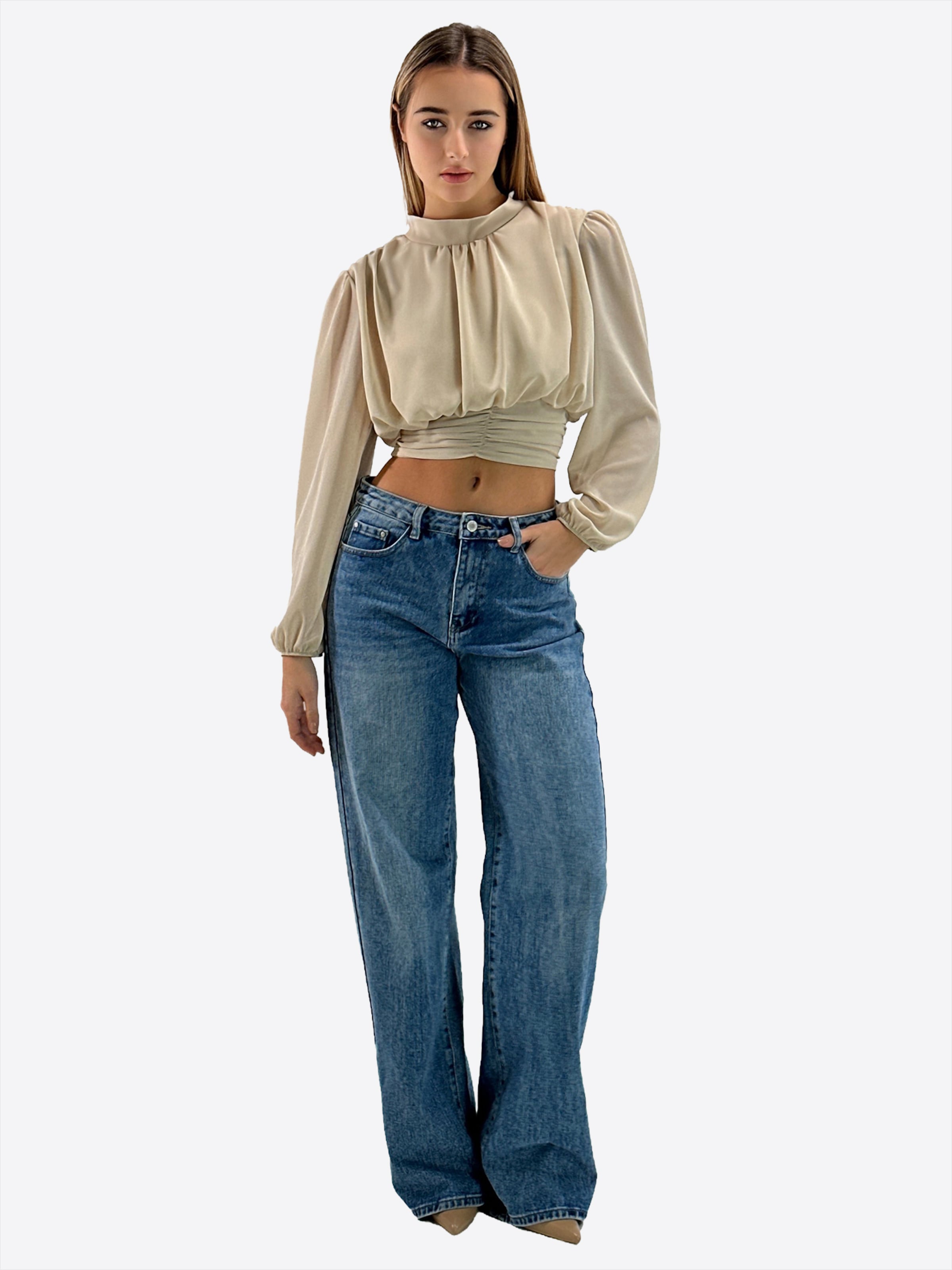 

Elara Блузка в бежевом цвете