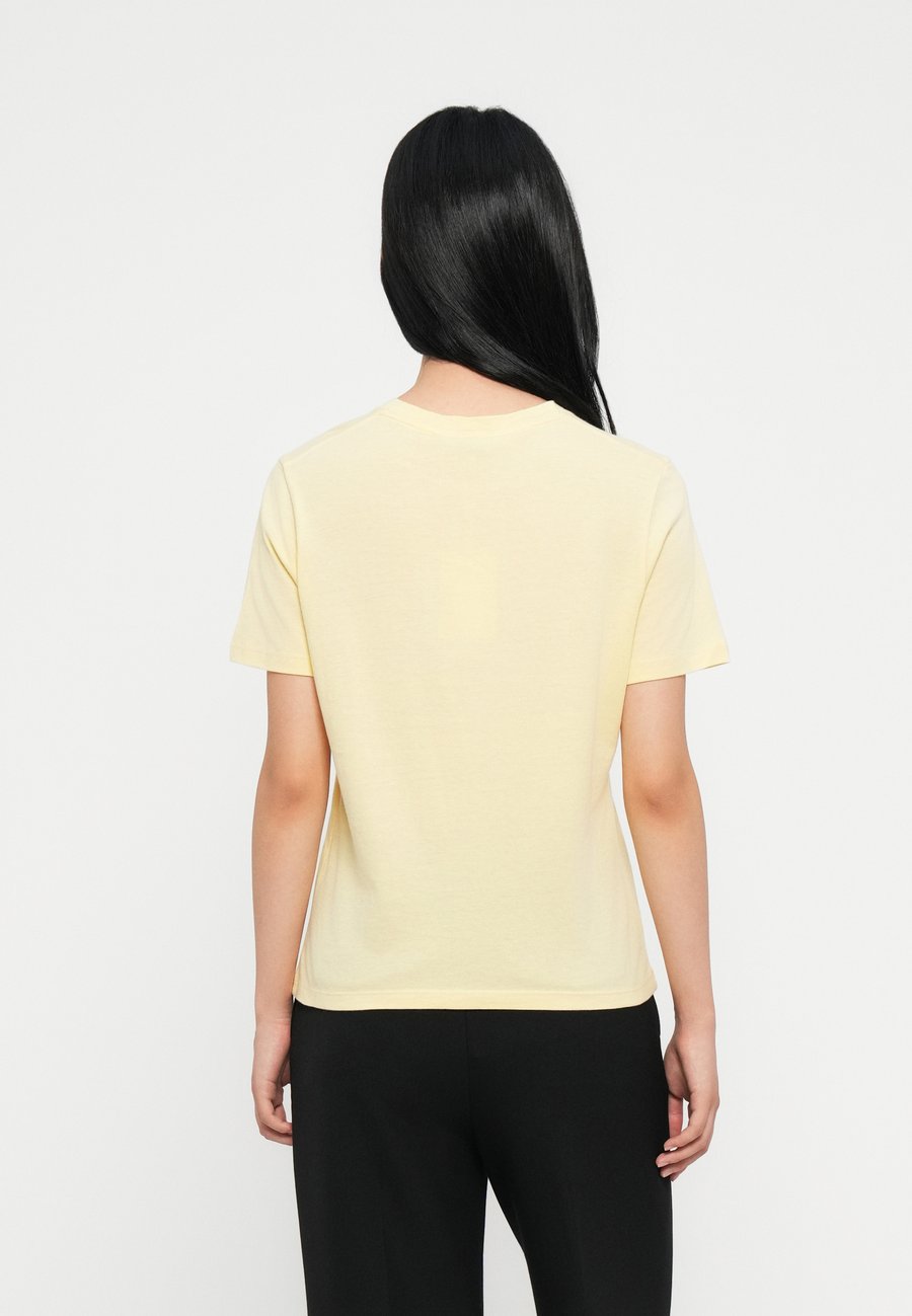 Футболка Tommy Hilfiger LOGO, Zesty Yellow/Yellow — фото 3