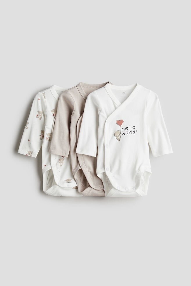 

В упаковке 3 боди с запахом H&M, бежевый