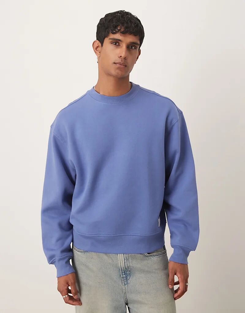 

Толстовка ASOS DESIGN свободного кроя с заниженной линией плеч и тканым лейблом в выбеленном синем цвете