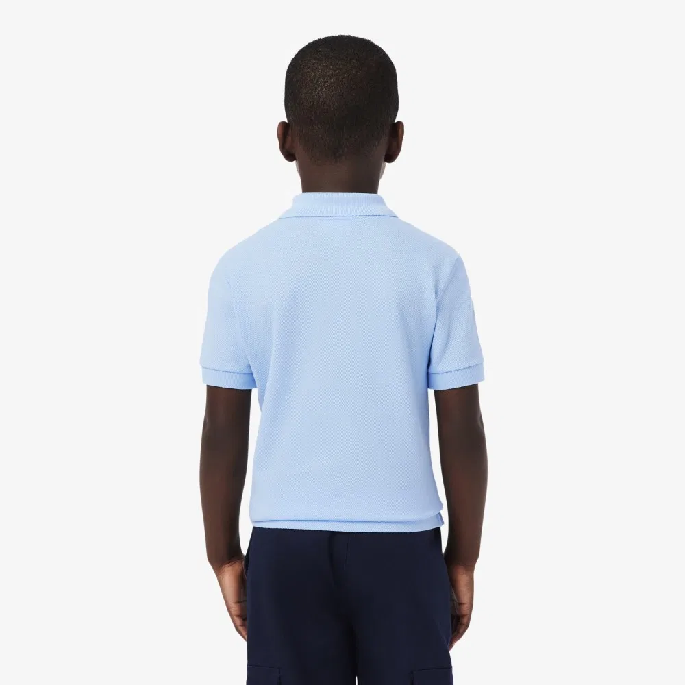 Детская голубая базовая футболка-поло от Lacoste — фото 3