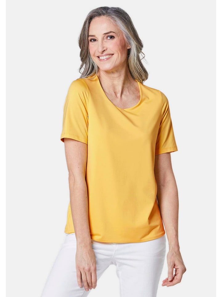 

Рубашка: Рубашка в хорошем состоянии из ткани, сохраняющей форму, лимонно-желтого цвета. GOLDNER