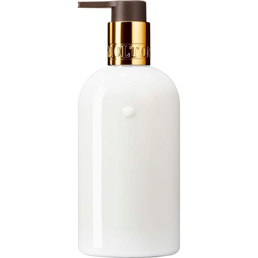 Крем для рук hand care mesmerising oudh accord & gold hand lotion Molton Brown, объем 300 мл — фото 2