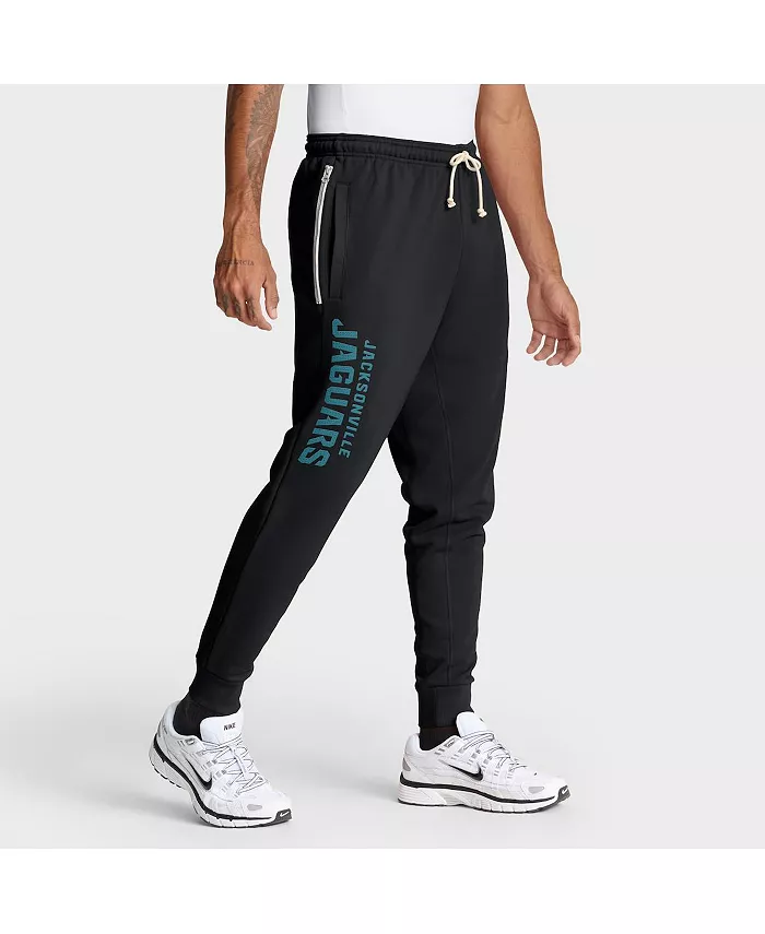 

Мужские черные брюки Jacksonville Jaguars Sideline Standard Issue Ground Game Dri-FIT Taper Nike