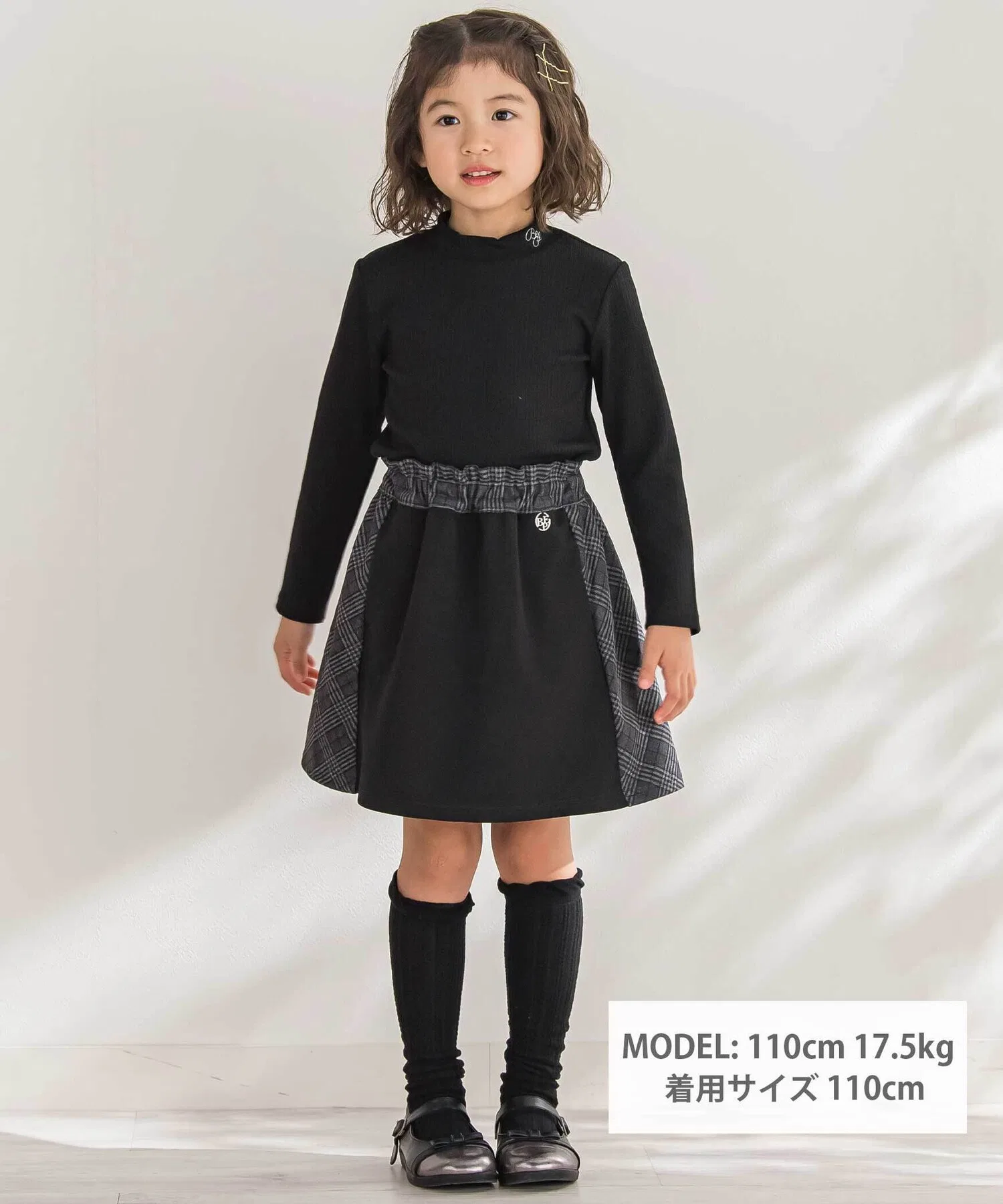 Детская юбка BeBe Petits Pois Vert в клетку с контрастной вставкой чёрная — фото 2