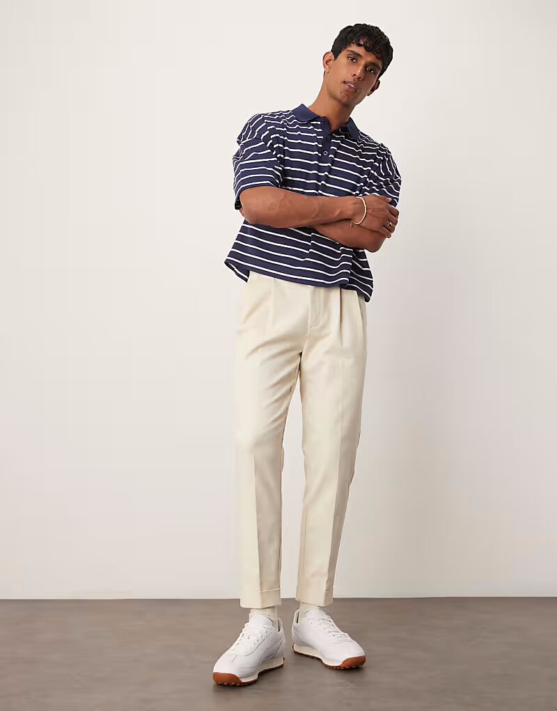 

Элегантные зауженные брюки ASOS DESIGN бежевого цвета с открытыми пуговицами