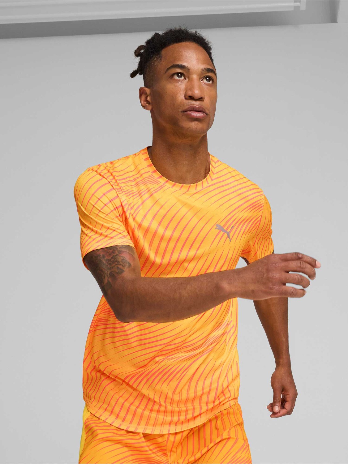 

Футболка Puma RUN FAVORITE AOP SS TEE M, оранжевый