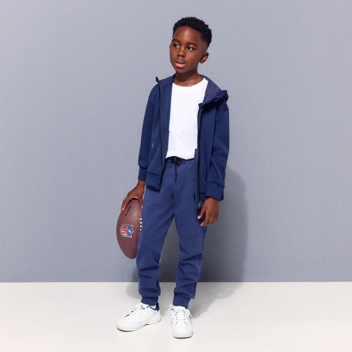 

Длинные брюки с манжетами в спортивно-повседневном стиле для мальчика Boomerang, синий