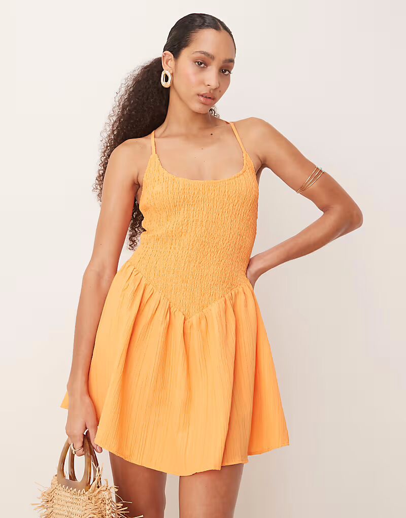 

Мини-платье ASOS DESIGN с круглым вырезом и перекрещенными деталями на спине цвета папайи