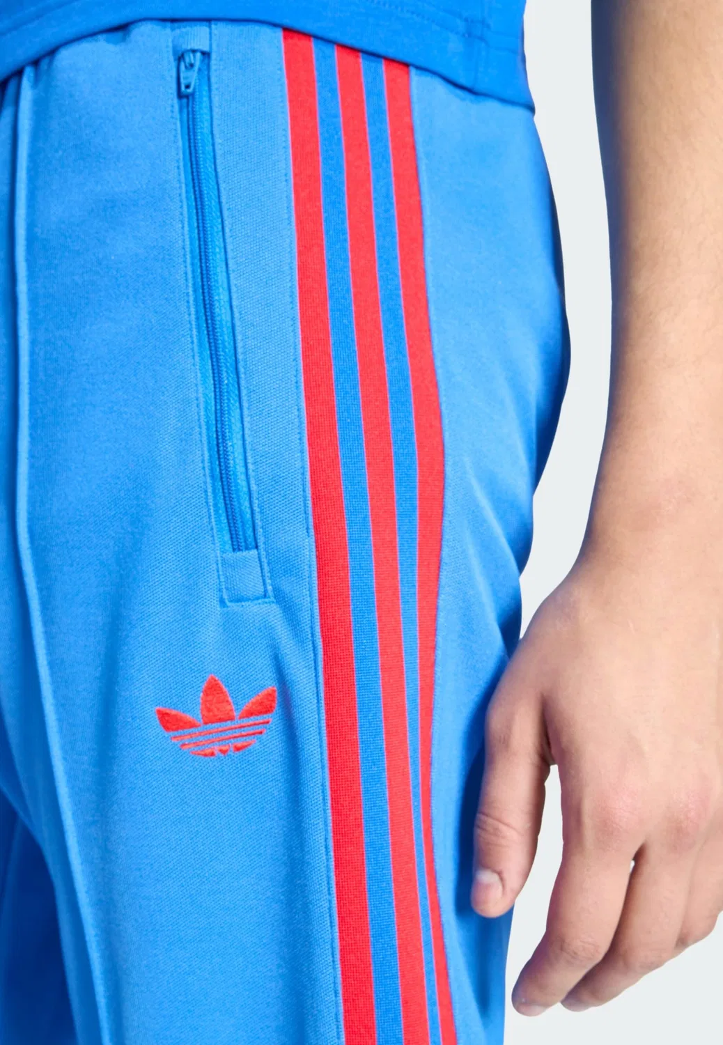 Брюки Adidas Originals Slim fit синего цвета — фото 4