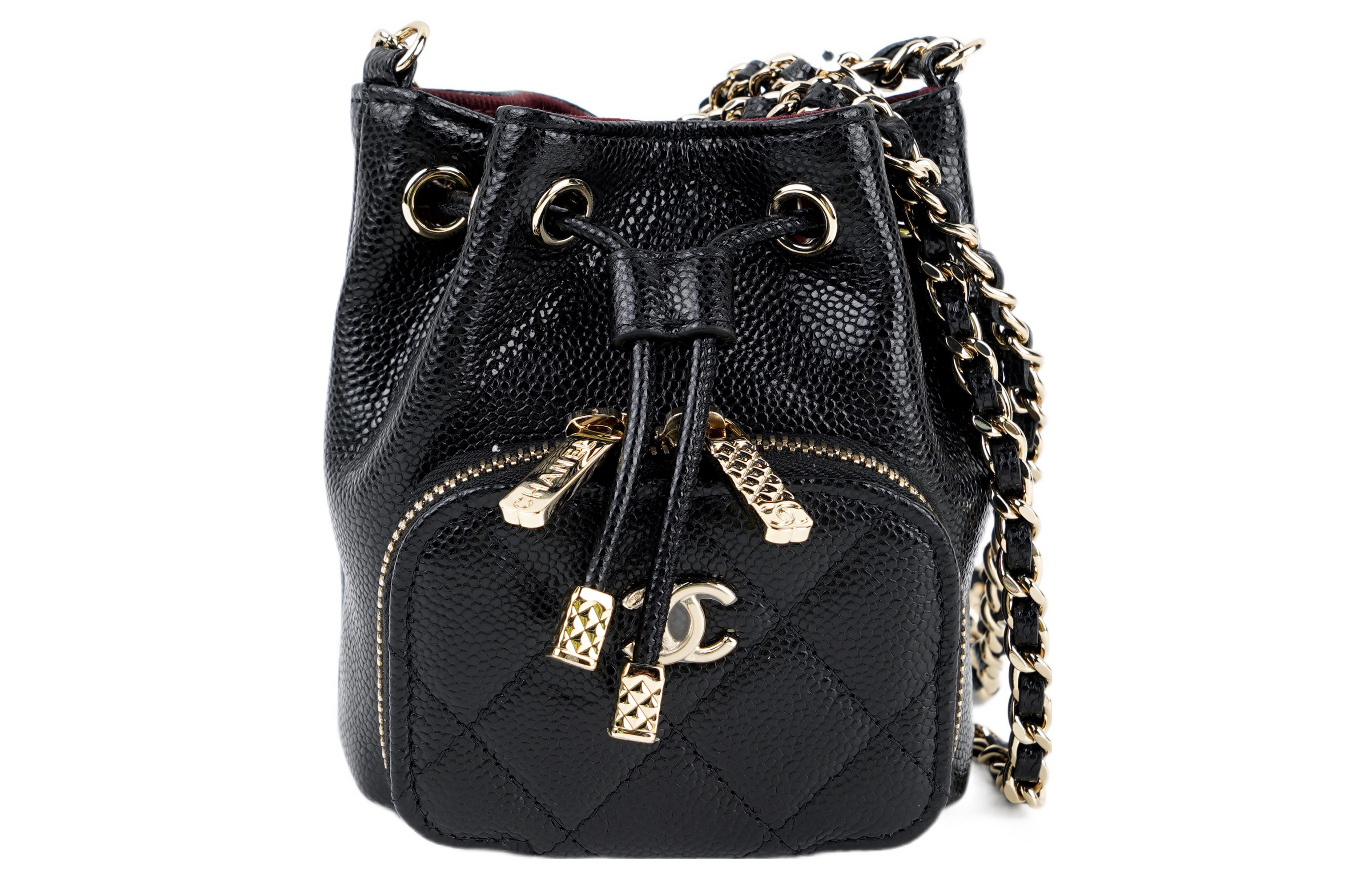 

CHANEL Мини-сумка-ведро с цепочкой из зернистой телячьей кожи, золотисто-черного цвета