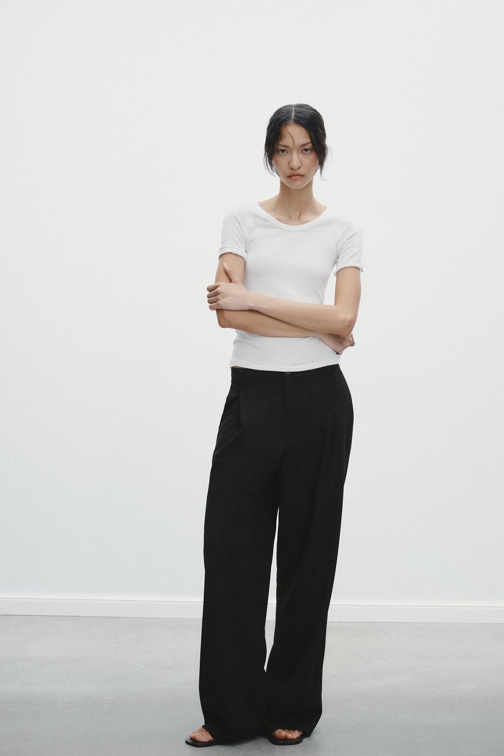 

Заштопанные брюки ZARA, черный