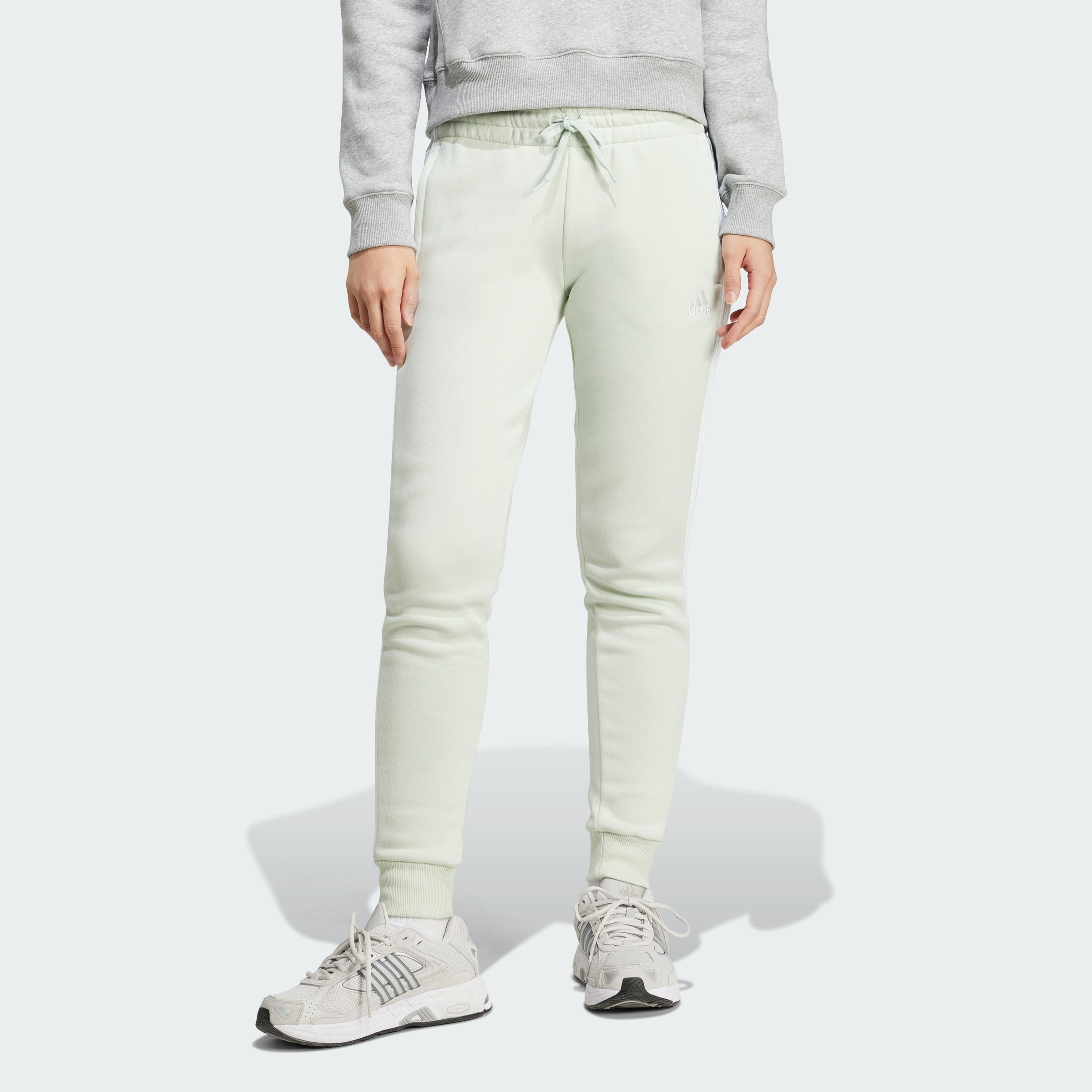 

Женские флисовые брюки Adidas Essentials с тремя полосками, цвет linen green/jh3686