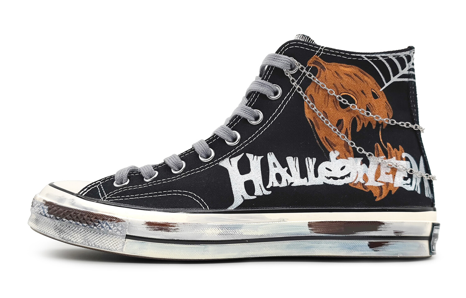 

1970-е годы. Кеды унисекс с высоким берцем, белые/оранжевые. Converse