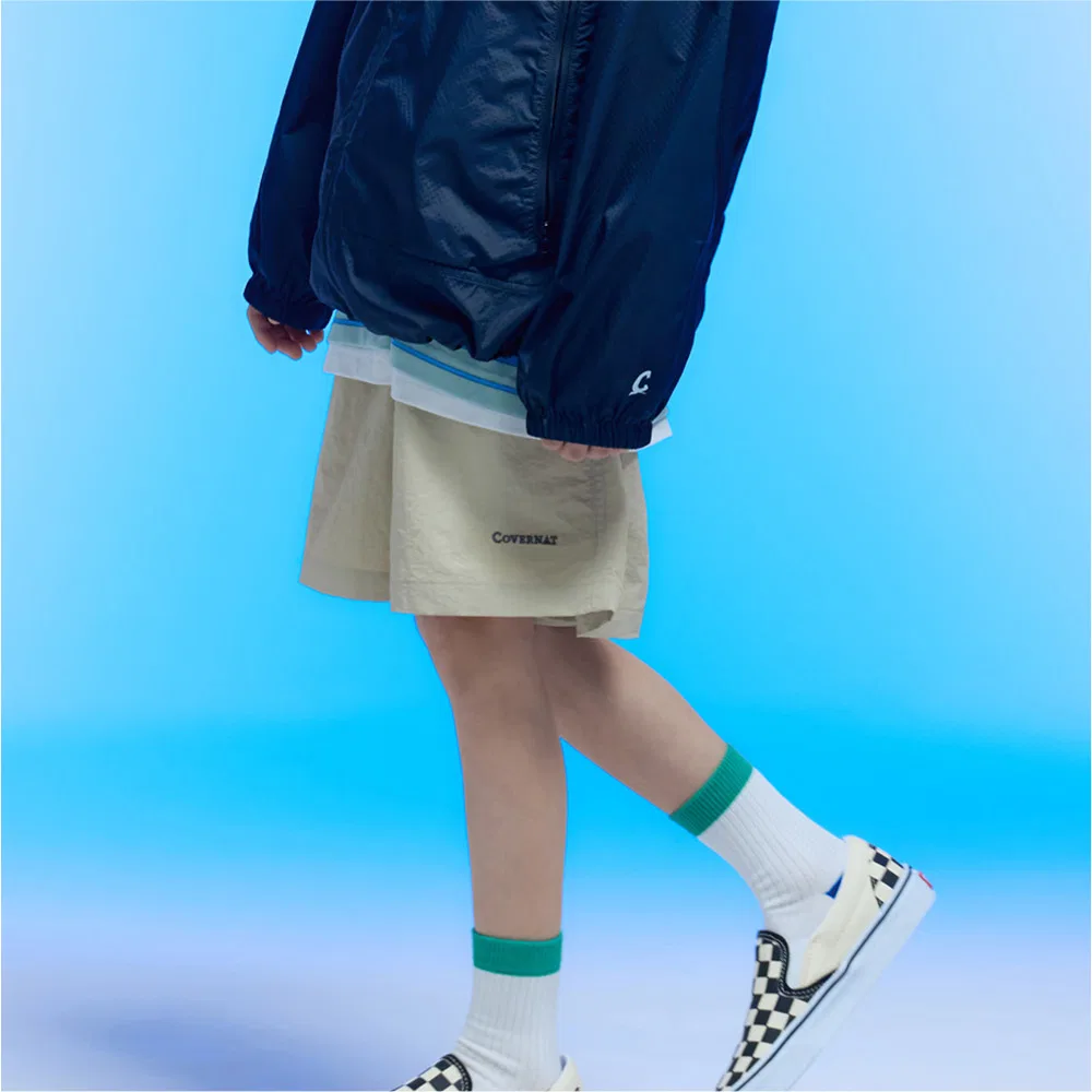 Детские шорты Wordmark бежевые от Covernat Kids
