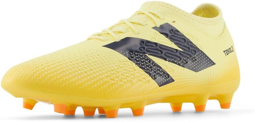 

Футбольные бутсы New Balance Kids' Tekela Magique FG V4, Parchment/Clementine/Hot Mango