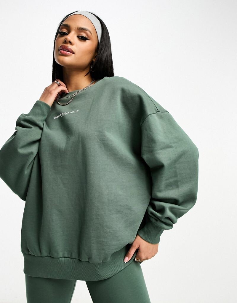 

Объемный свитшот цвета хаки с большим логотипом на спине ASOS Weekend Collective