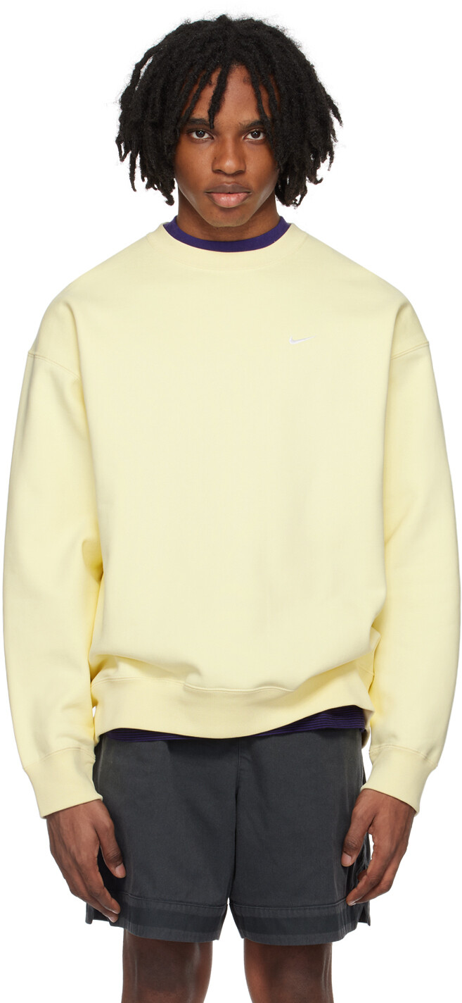 

Желтая толстовка Solo Swoosh Nike