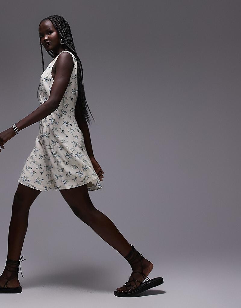 

Мини-платье цвета слоновой кости с V-образным вырезом Topshop и цветочным узором