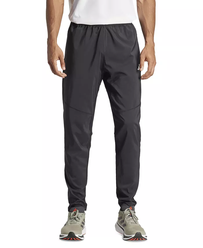 

Мужские влагоотводящие брюки Own The Run Woven adidas, черный