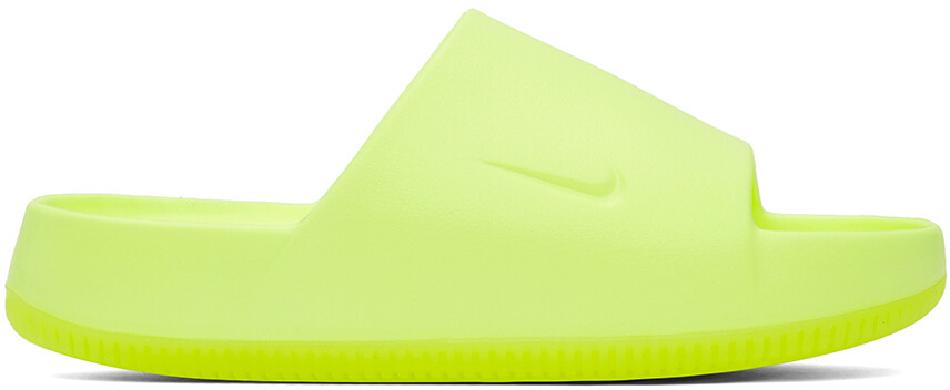 

Желтые спокойные шлепанцы Nike