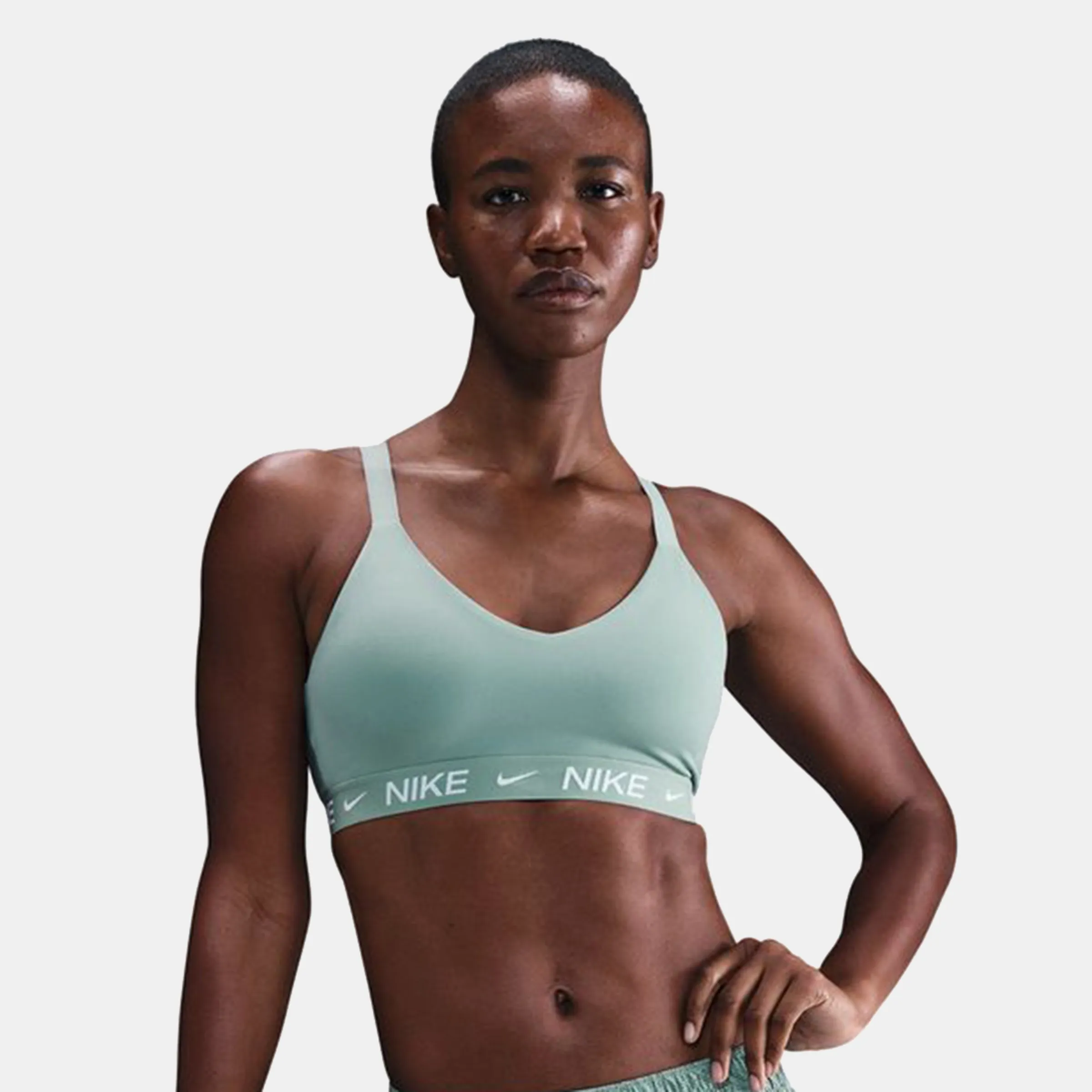 

Женский топ Indy с поддержкой средней степени Nike, синий