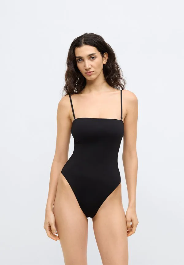 Цельный купальник без бретелей - базовый элемент гардероба. Calvin Klein Swimwear, Black — фото 4