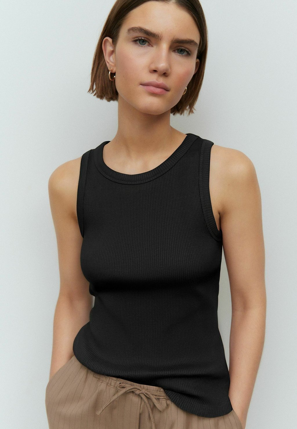 

Топ RACER SLEEVELESS Next, черный