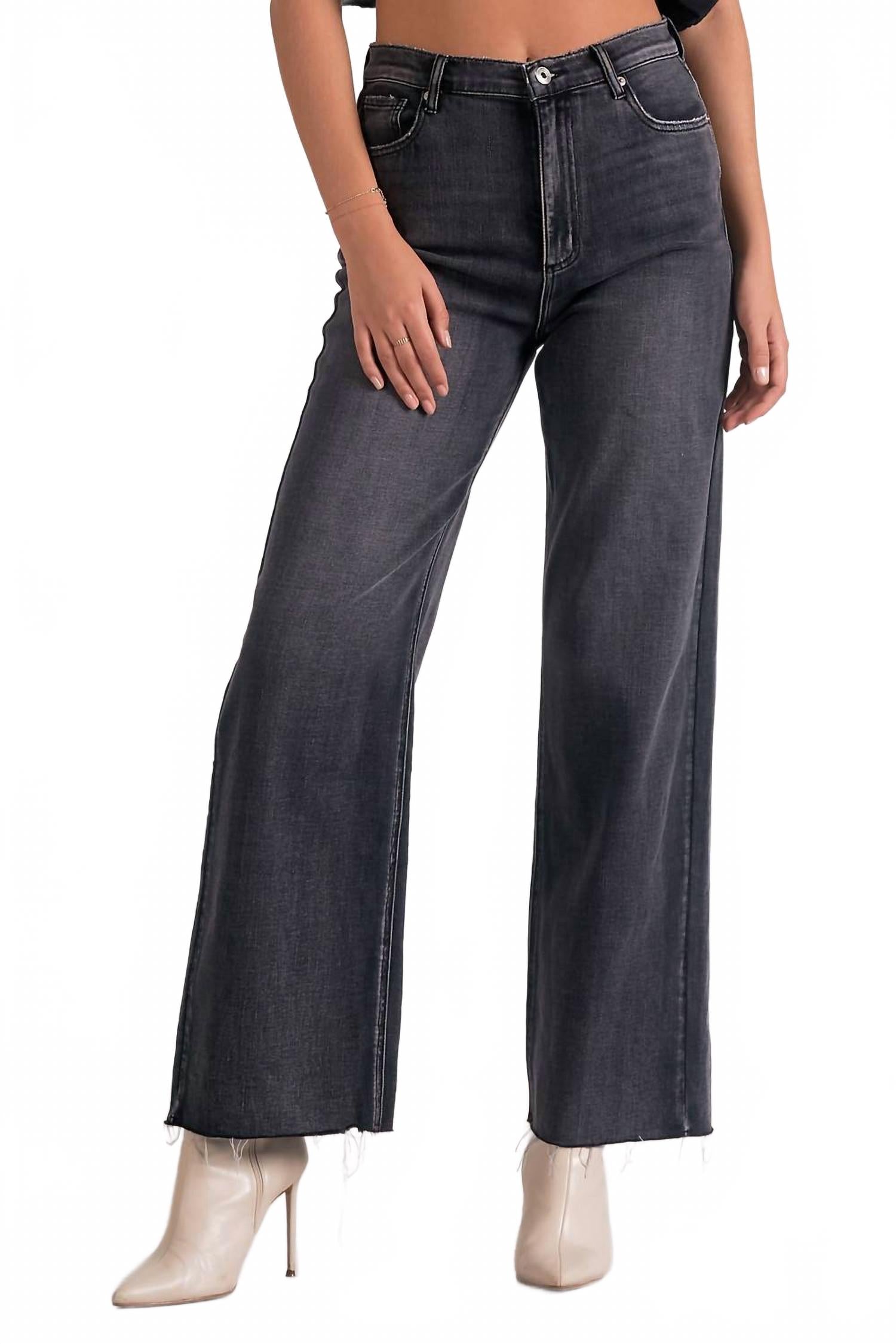 

Широкие джинсы в черной мойке ELAN