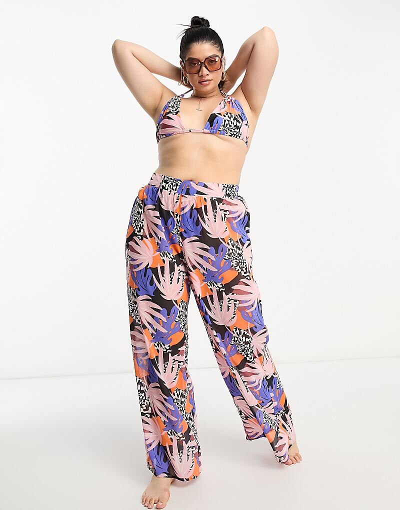 

We Are We Wear Plus – Tania – Широкие пляжные брюки с тропическим узором 3r