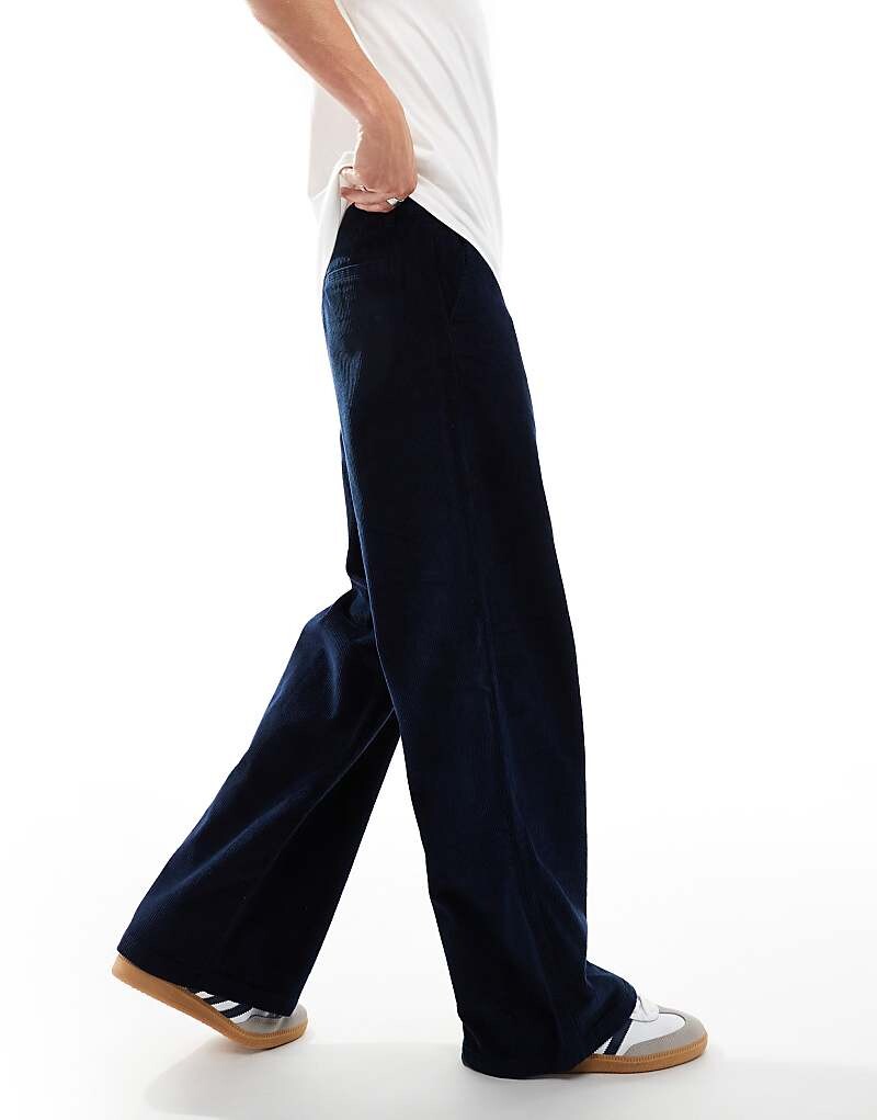 

Темно-синие суперширокие вельветовые брюки ASOS DESIGN