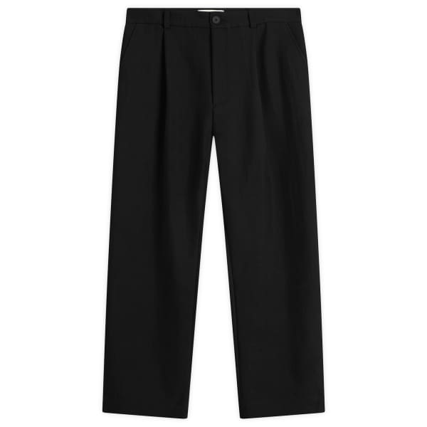 

Хлопковые брюки зауженного кроя с подворотами Studio Nicholson, черный