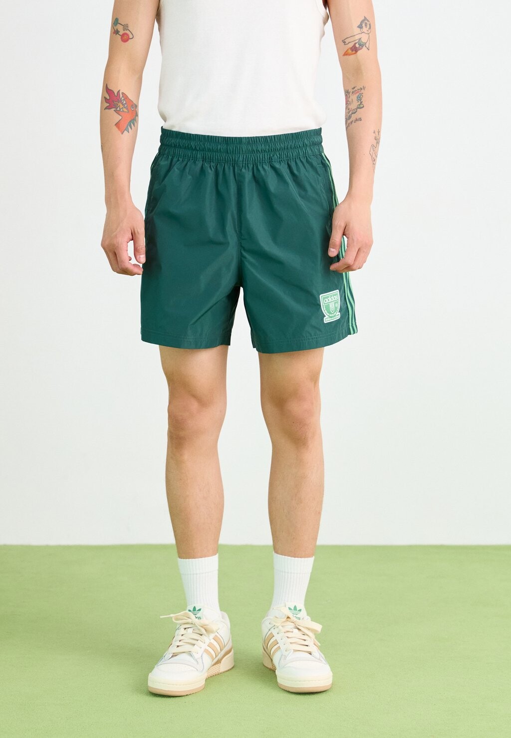 

Спортивные штаны GRAPHICS SPRINTER adidas, зеленый