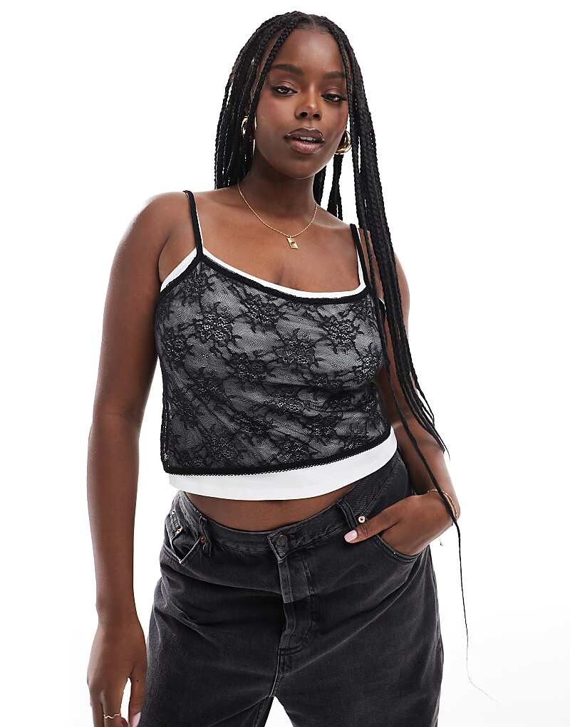 

Двухслойная черно-белая майка ASOS DESIGN Curve =f с контрастным кружевом