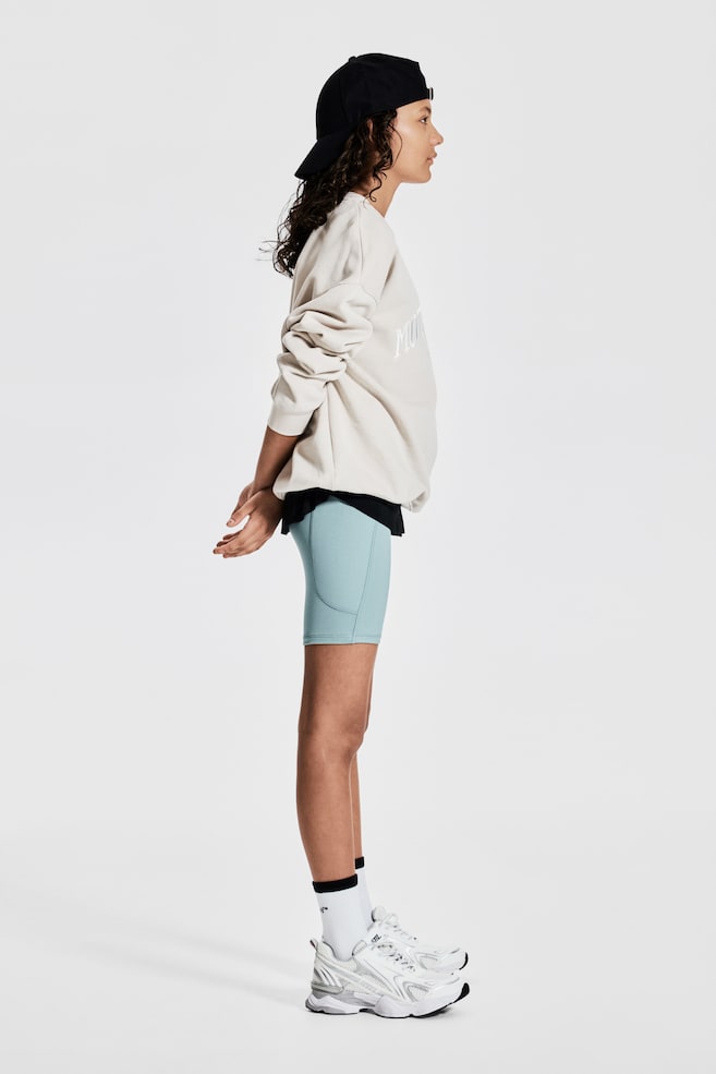 

Спортивные велосипедные шорты с технологией DryMove H&M, бирюзовый
