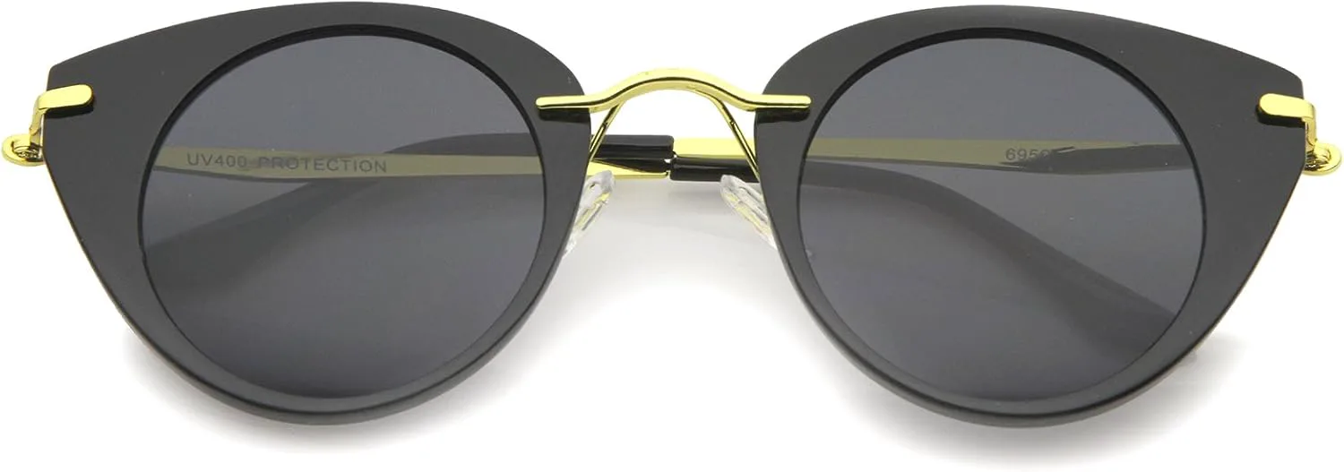 

Женские солнцезащитные очки zeroUV с массивной металлической переносицей, тонкими дужками и круглой оправой «кошачий глаз», диаметр линз 46 мм, Black-gold / Smoke