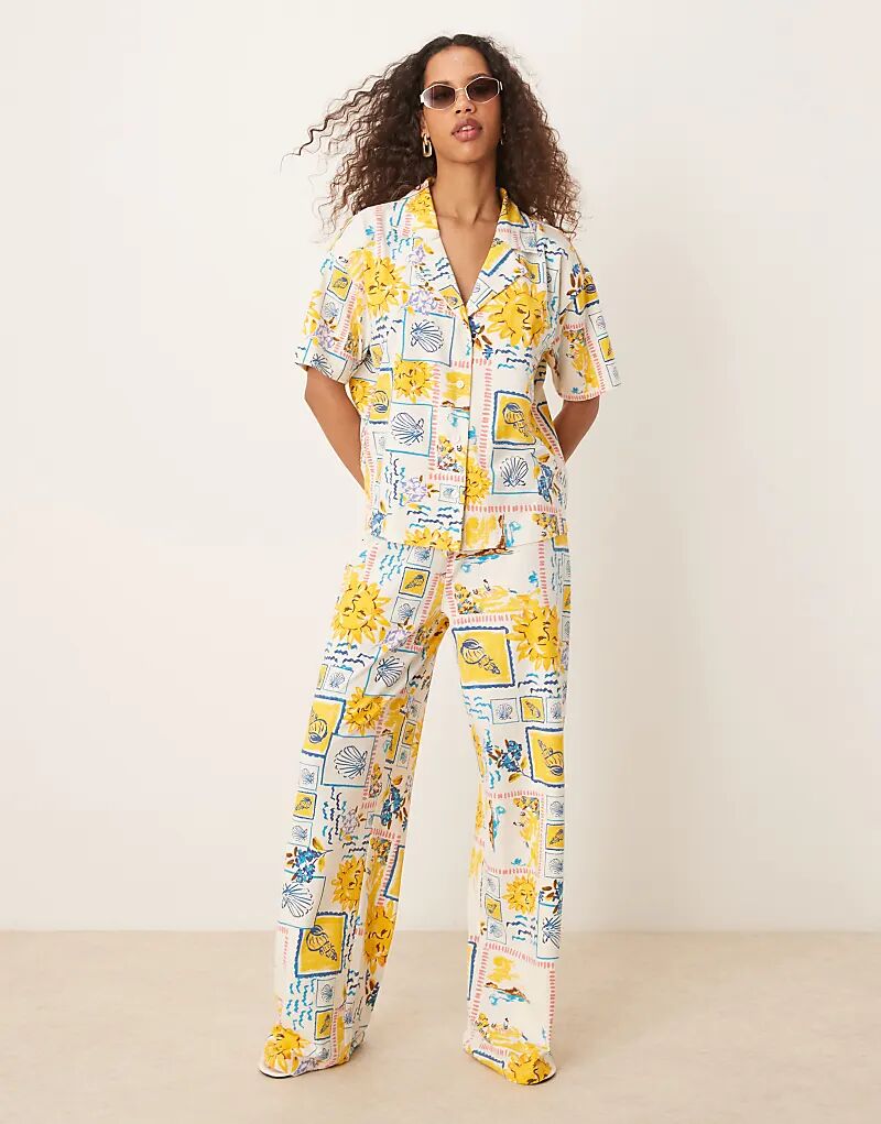 

Широкие брюки ASOS DESIGN из льняного материала с принтом открытки