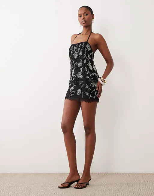 

Кружевное мини-мини с многослойным лифом и приталенной юбкой ASOS DESIGN, украшенное монохромной отделкой по всей поверхности