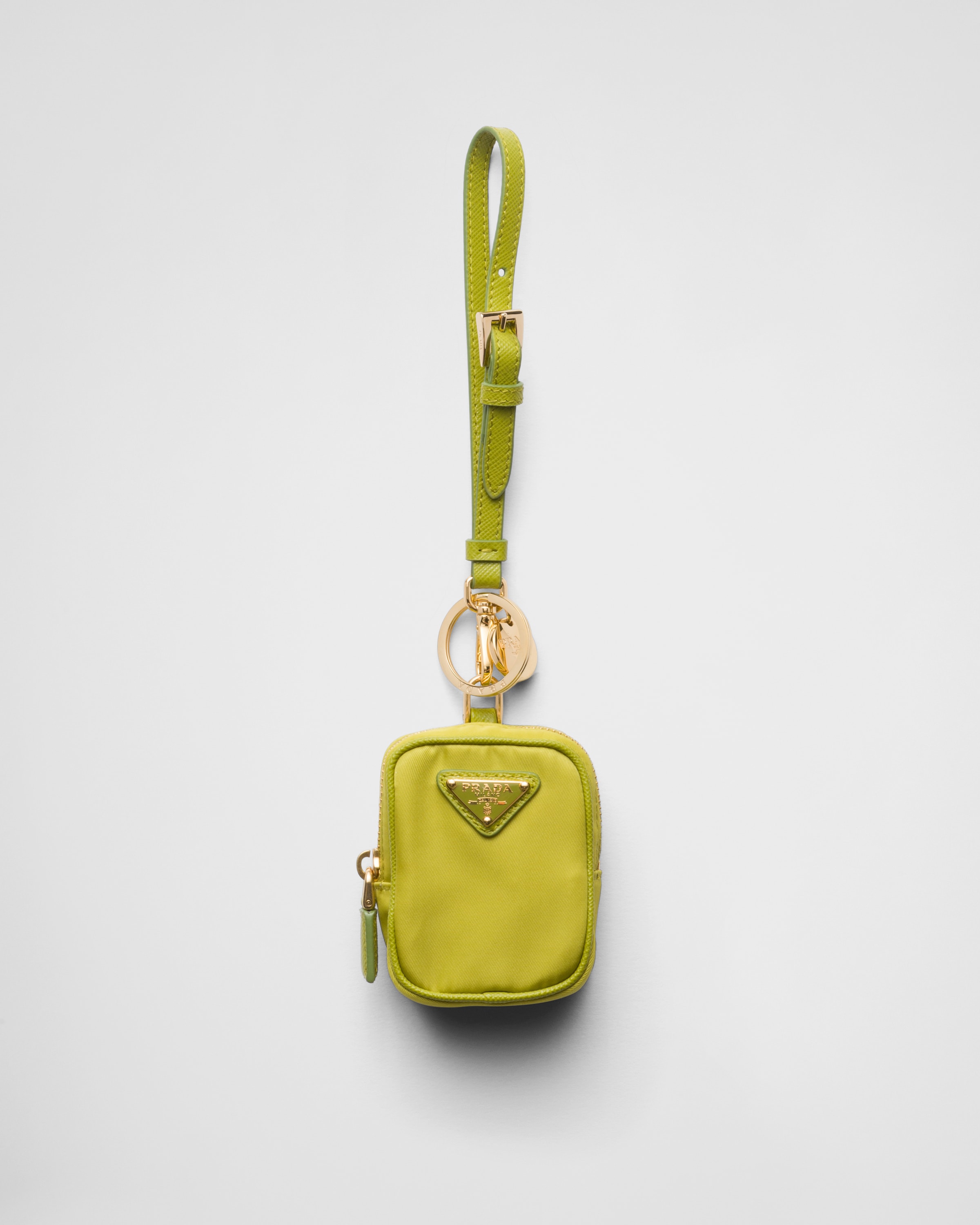 

Мини-сумка Prada Re-Edition 1978 из переработанного нейлона, зеленый