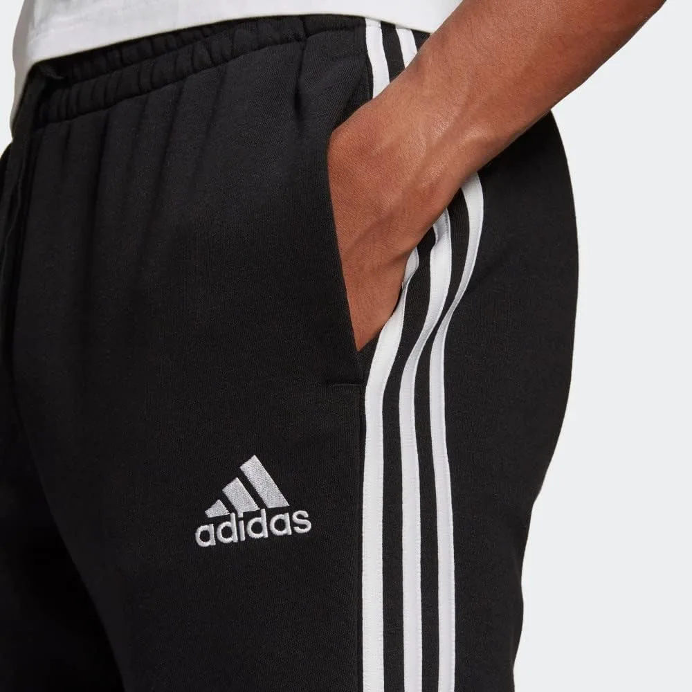 Мужские флисовые брюки Adidas Essentials с тремя полосками и зауженными манжетами, черно-белый — фото 2
