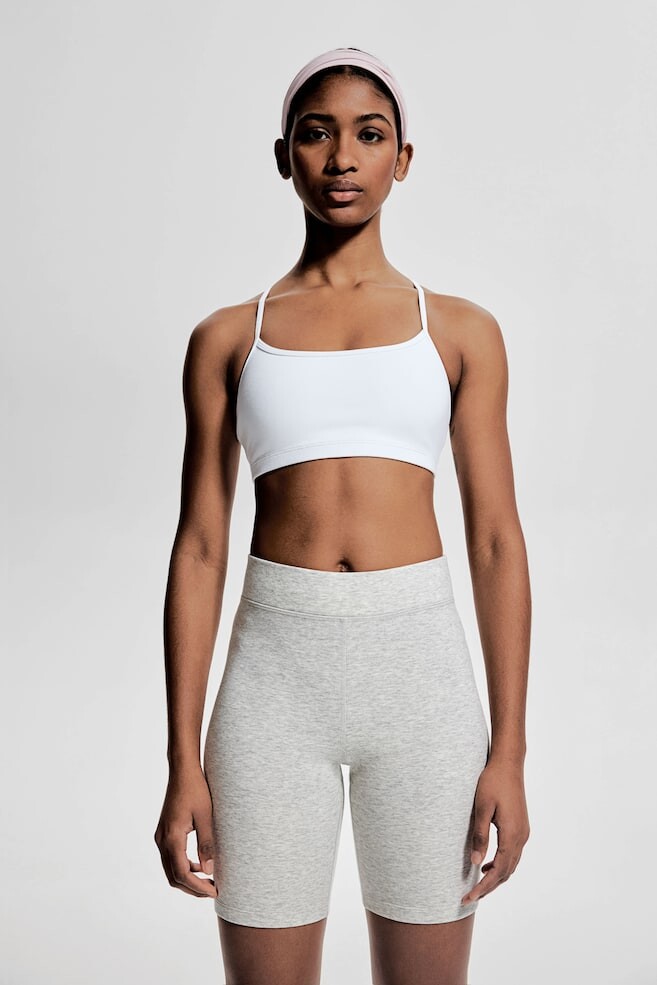 

Спортивный бюстгальтер из материала drymove легкая поддержка H&M, белый