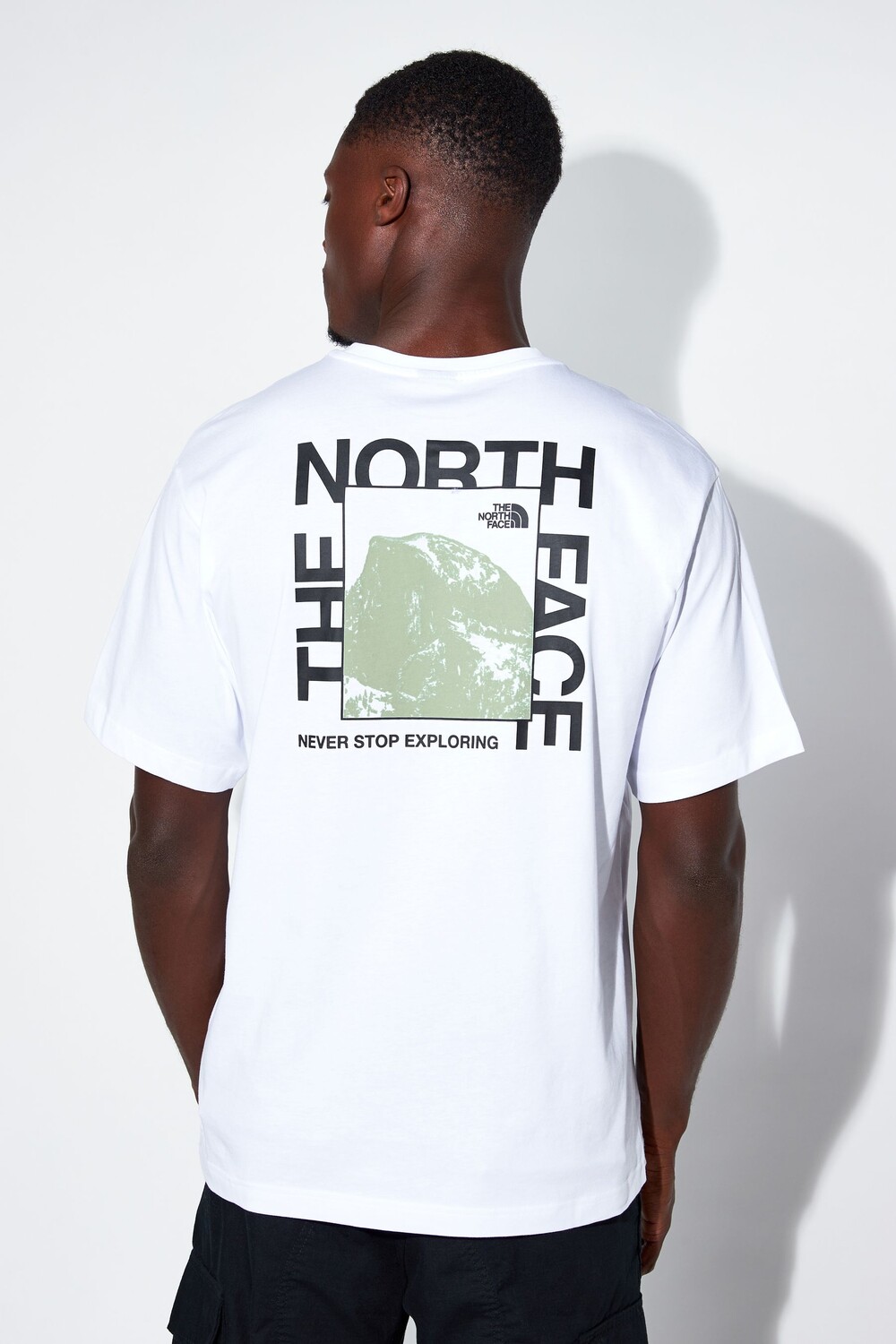 

Футболка свободного кроя с полукупольным принтом на спине The North Face, белый