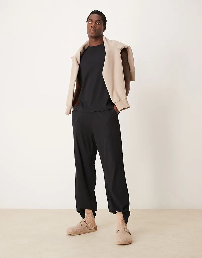 

Пижамный комплект ASOS DESIGN свободного кроя из черного трикотажа в рубчик