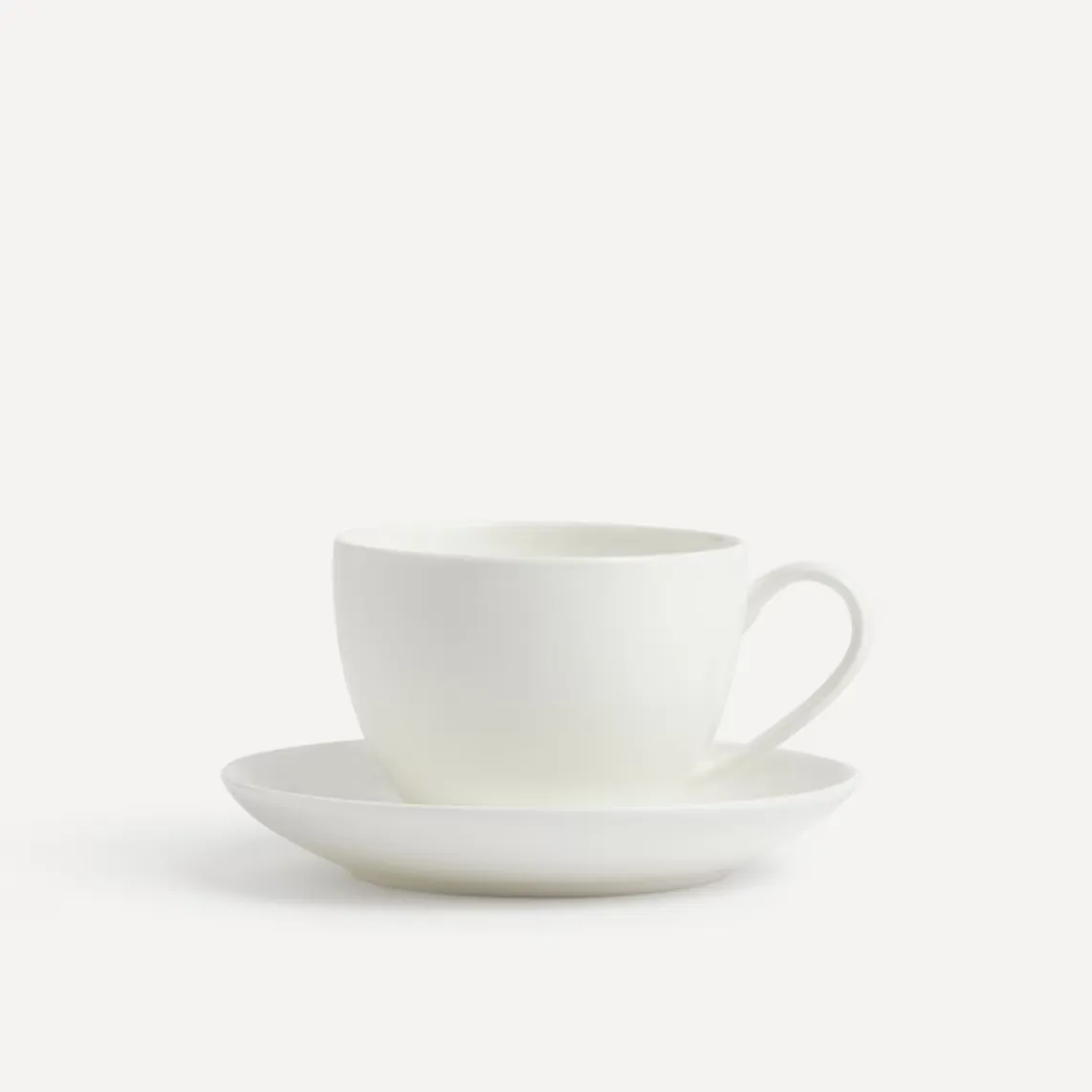 

Чайная чашка Bone China Essential El Corte Inglés с круглым блюдцем, белый