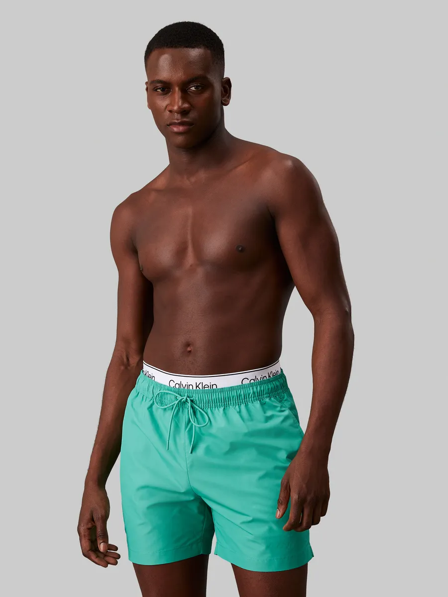 

Купальные шорты Calvin Klein Swimwear с логотипом, цвет Jade Tide
