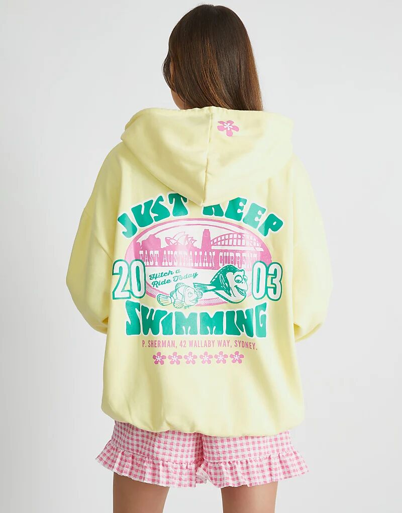 

Skinnydip London Disney В поисках Немо Продолжай плавать Толстовка желтого цвета