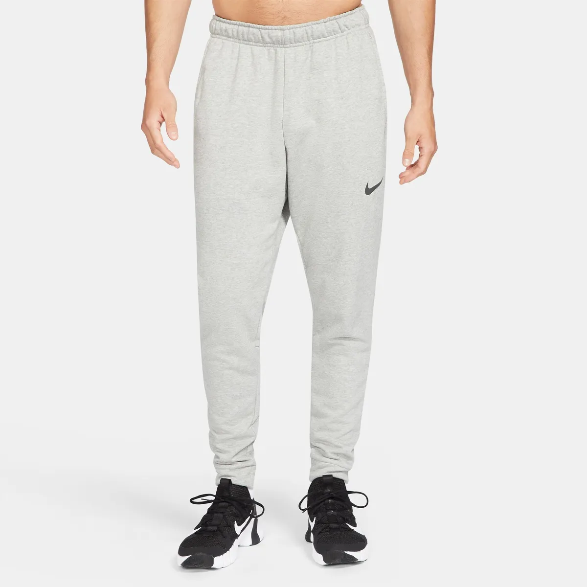 

Тренировочные брюки Nike "DRI-FIT MEN'S TAPERED TRAINING PANTS", серый