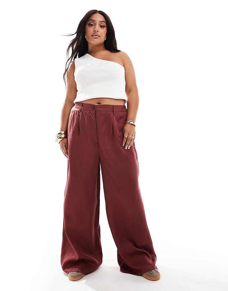 

Бордовые брюки стираного цвета ASOS DESIGN Curve Dad