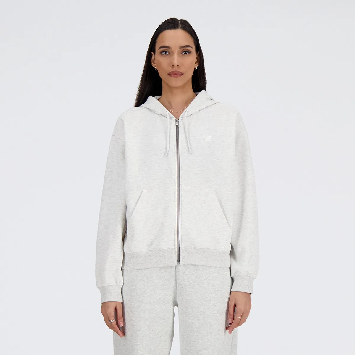 

Женская куртка Sport Essentials Fleece Full Zip New Balance, серый