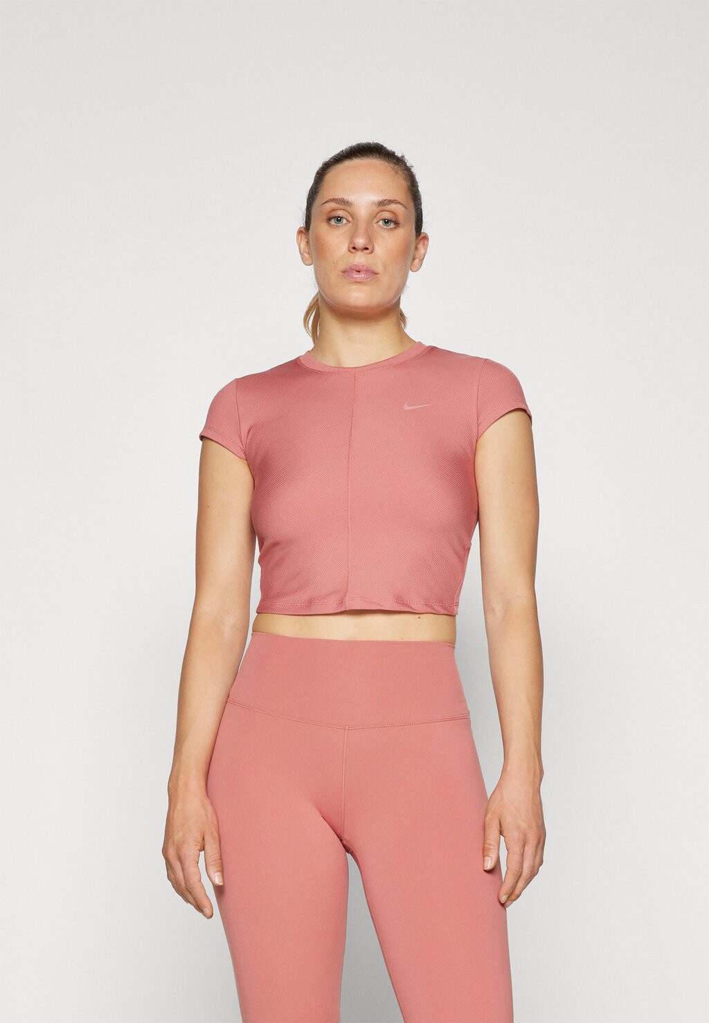 

Спортивная футболка ONE CAPSULE Nike, розовый